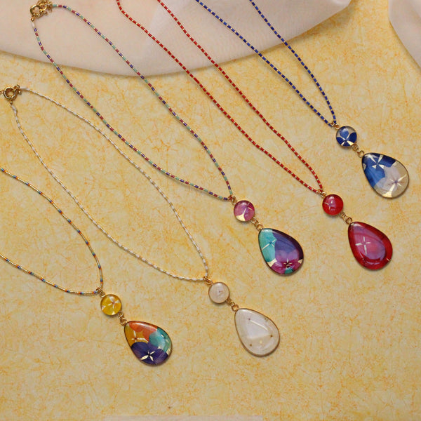 Beaded necklace with drip charm